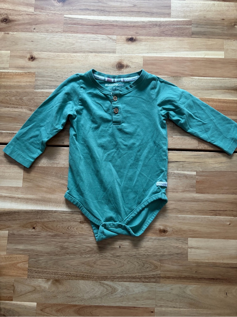 Ruffle Butts Green Long-Sleeve Henley Baby Bodysuit